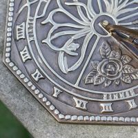 Close-Up of Floral Design in Antique Brass Finish