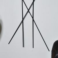 Close-up of the Ends of the Antique Bronze Feathers Wall Art