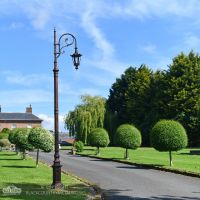 Antique Copper Garden Lamp Post Installed On Driveway