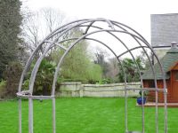 Close-up of the Arched Design on the Antique Grey Arbour Bench