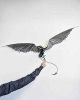Scale Shot of Artist Piece - Bespoke Recycled Metal "Askook" Dragon Wall Art - Black