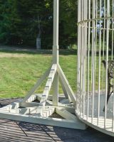 Close up of base detail on ivory coloured steel garden gazebo