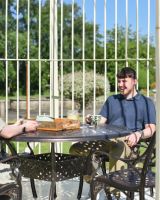 In situ photo of garden party in deluxe gazebo