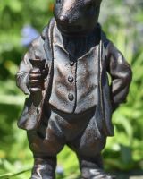 Close up of clothes detail on animal garden statue