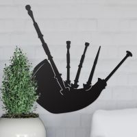 Bagpipe Wall Art on the Wall Next to Plants