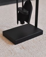 Close up of freestanding base on fireside companion set