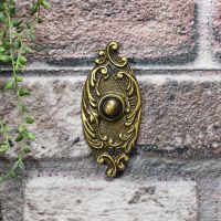Exterior Door bell push button finished in Antique Brass