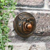 ornate round lion face door bell 