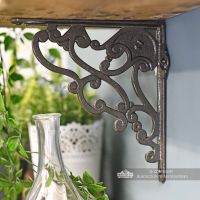 Side view of natural cast iron living room decorative shelf bracket