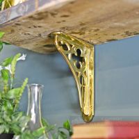 Polished brass shelf bracket