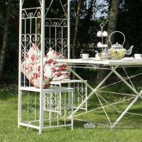Iron chair built into gazebo framework