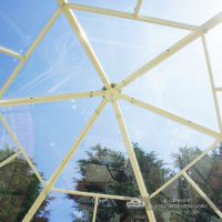 Glass panel roof on metal gazebo