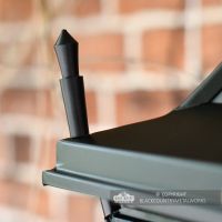 Corner finial on black Gothic lantern