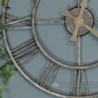 Close up of rustic finish on garden clock