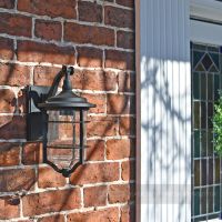 Beautiful nautical garden lantern on brick wall