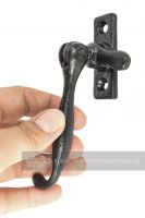 Hand using Contemporary Iron Casement Stay
