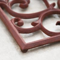 Close-up of the "Belleview" Rectangle Heart Doormat on a Titled Floor