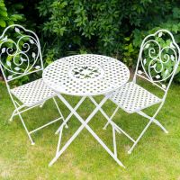 Bird & Leaf Design Bistro Set in Use in the Garden