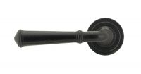 Black Beeswax Lever Door Handle on Art Deco Rose Front