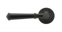 Black Beeswax Lever Door Handle on Beehive Rose Front