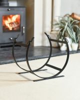 Empty Black Blacksmith Curved Log Rack In Situ