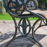 Close up of Aged Black Cast Iron Bench Leg