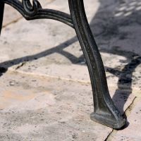 Close up of Cast Iron Aged Black Bench Leg