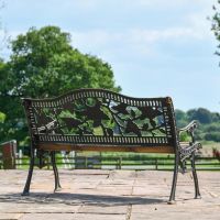 Rear view of Aged Black Cast Iron & Wood "Rose" Bench