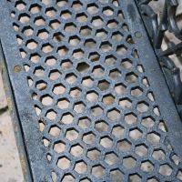 Close up of honeycomb design on three seater bench 