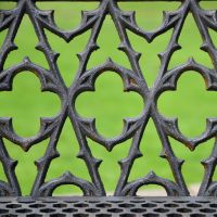 Close up of decorative design on three seater "Quatrefoil" bench 