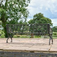 Rear view of Cast Iron Aged Black Three Seater Bench 