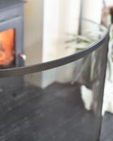 Close Up Of Black Contemporary Curved Single Panel Fire Guard Curved Panel