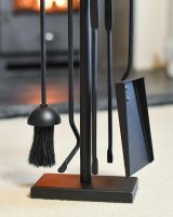 Close-Up of Black Contemporary Loop Handle Four Piece Companion Set - 29cm