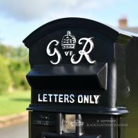 Black Curved Top GR Post Box & Stand With White Lettering