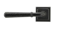 Black Hammered Lever Door Handle on Square Rose