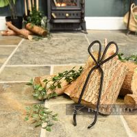 Iron Coal Tongs in Situ Next to the Fireplace
