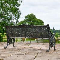 Rear view of Cast Iron Aged Black Garden Bench in Situ