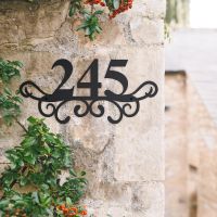 Traditional Iron Ornate Number Sign in Situ