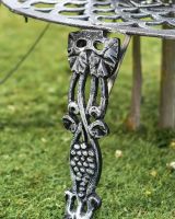 Close-Up of Ornate Pattern on Leg Supports