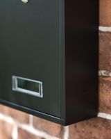 Close-Up of Visible Mail Check on the Post Box