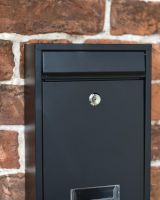 Close-up of the Lock on the Door of the Post Box