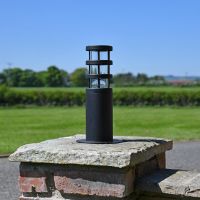 Black Stainless Steel Contemporary Pedestal Light on a Brick Pillar