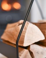 Close-Up of Black Open Design "Tepee" Log Holder