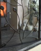 Close-Up of Black Three Fold Fire Guard with Leaf Detailing - 100cm