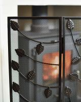 Close-Up of Black Three Fold Fire Guard with Leaf Detailing - 100cm in Situ