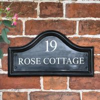 Black Traditional House Name Sign in Situ on the Front of a Wall
