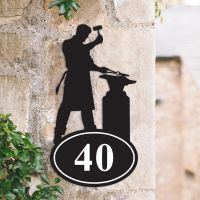 Bespoke Blacksmith Iron House Number Sign on a Garden Wall