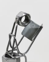 Close up of intricate book detail on scrap metal art sculpture