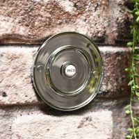 Chrome door furniture, circular door bell