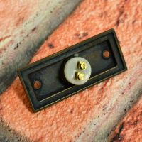 Terminals on back of bell push for wiring to chime